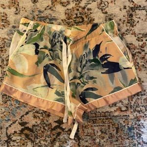 Stars above pajama shorts.